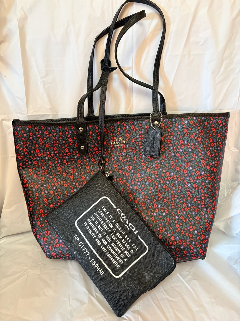 COACH Reversible Black and Red Floral Tote Bag with Black Pouch